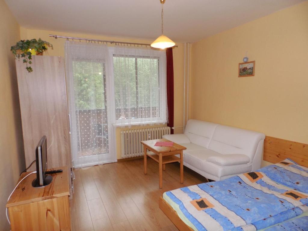 A bed or beds in a room at Apartmán Zdravie Horný Smokovec