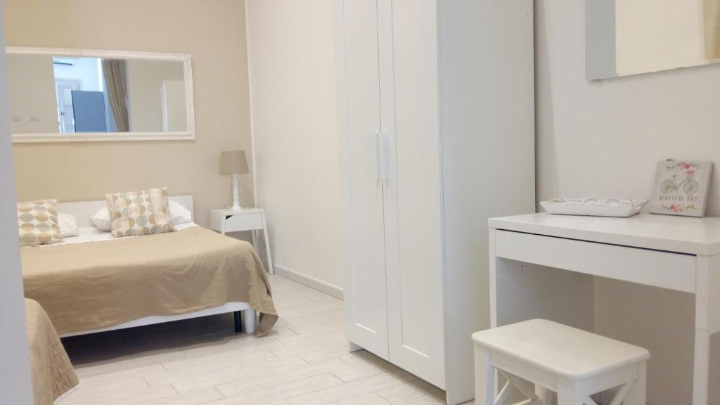 Postel nebo postele na pokoji v ubytování Appartamenti e Camere Silva Trapani