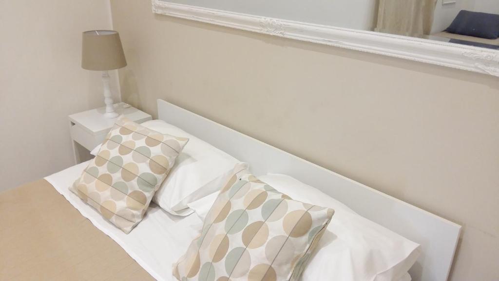 Postel nebo postele na pokoji v ubytování Appartamenti e Camere Silva Trapani