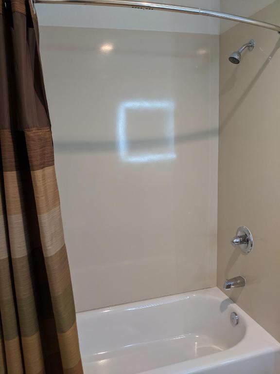 Koupelna v ubytování Epic Hotel