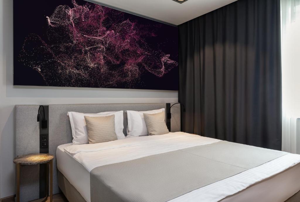 Postel nebo postele na pokoji v ubytování Hotel River Park