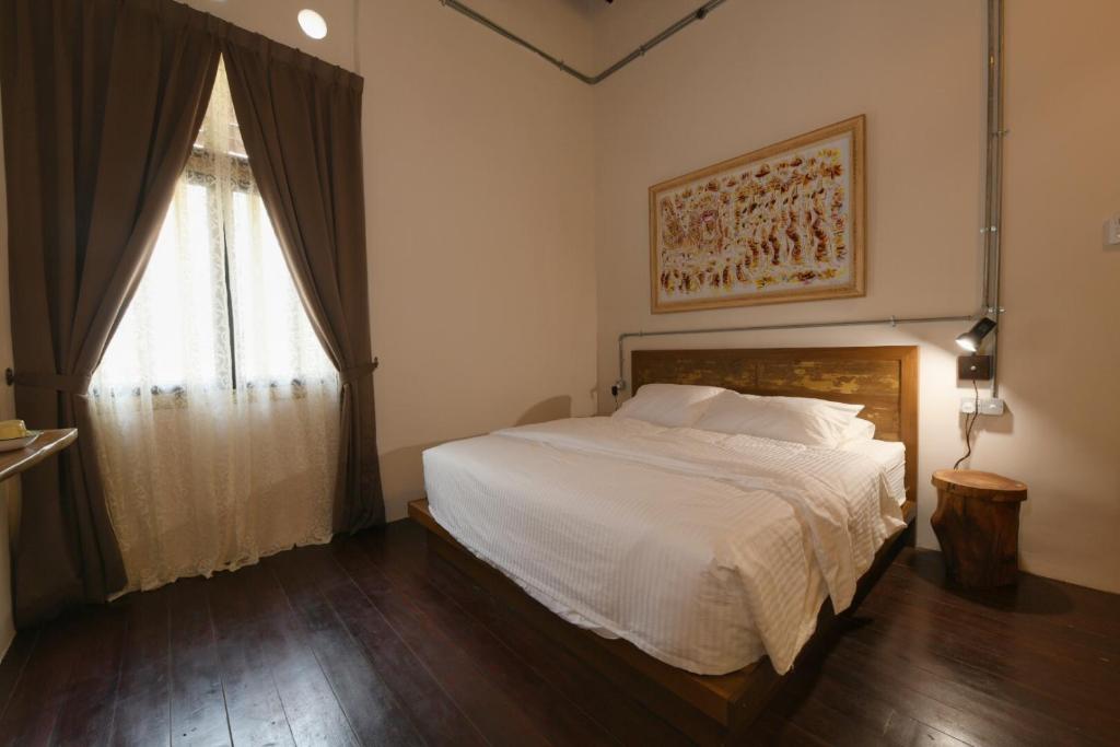 Postel nebo postele na pokoji v ubytování 38PC Boutique Hotel
