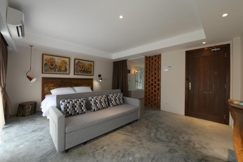 Postel nebo postele na pokoji v ubytování 38PC Boutique Hotel