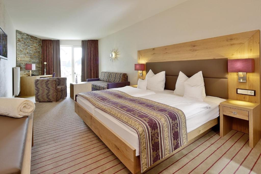 Postel nebo postele na pokoji v ubytování Göbels Landhotel