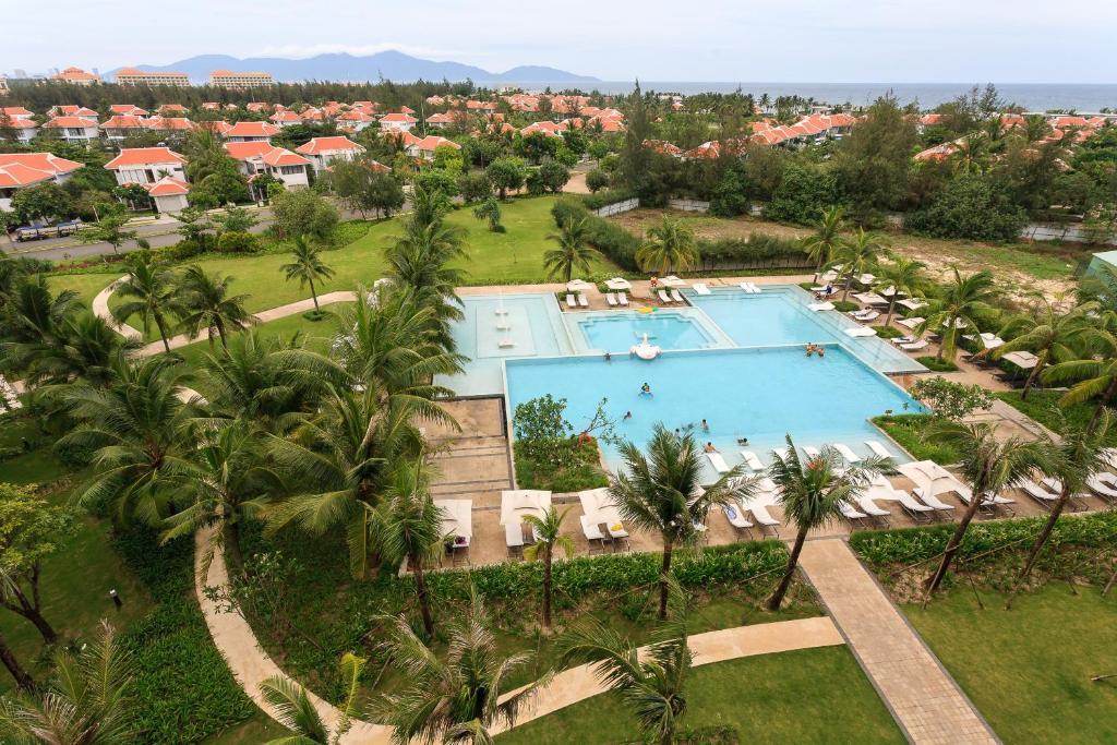 an aerial view of a pool at a resort at The Ocean Apartment IDCWH B602 in Danang