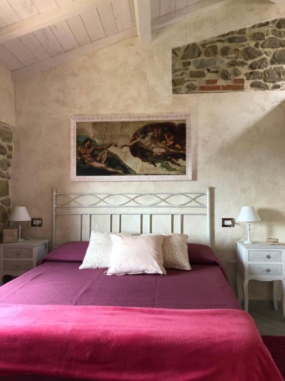 Postel nebo postele na pokoji v ubytování Iris Country House