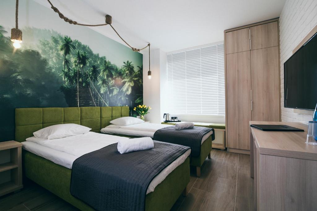 Postel nebo postele na pokoji v ubytování Aquapark Reda - Green Village