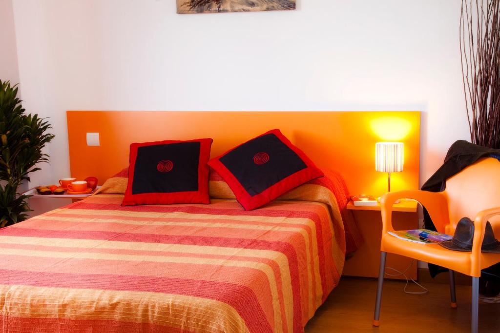 Postel nebo postele na pokoji v ubytování Apartamentos Bahía de Boó