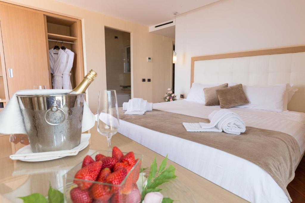 Postel nebo postele na pokoji v ubytování Hotel Villa Esperia