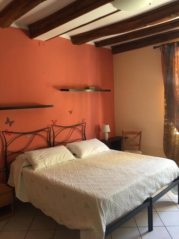 Postel nebo postele na pokoji v ubytování Il Ghiretto Appartamento