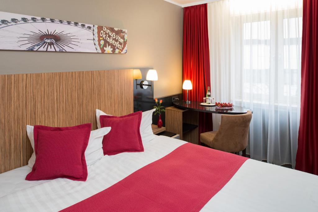Postel nebo postele na pokoji v ubytování Hotel Munich City