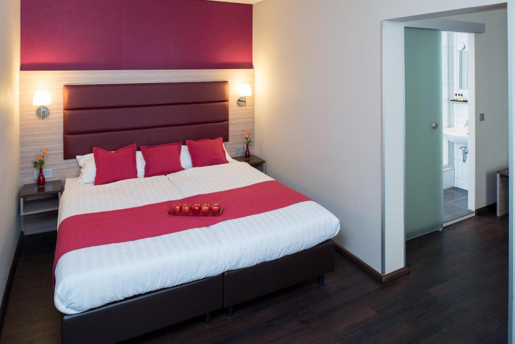 Postel nebo postele na pokoji v ubytování Hotel Munich City
