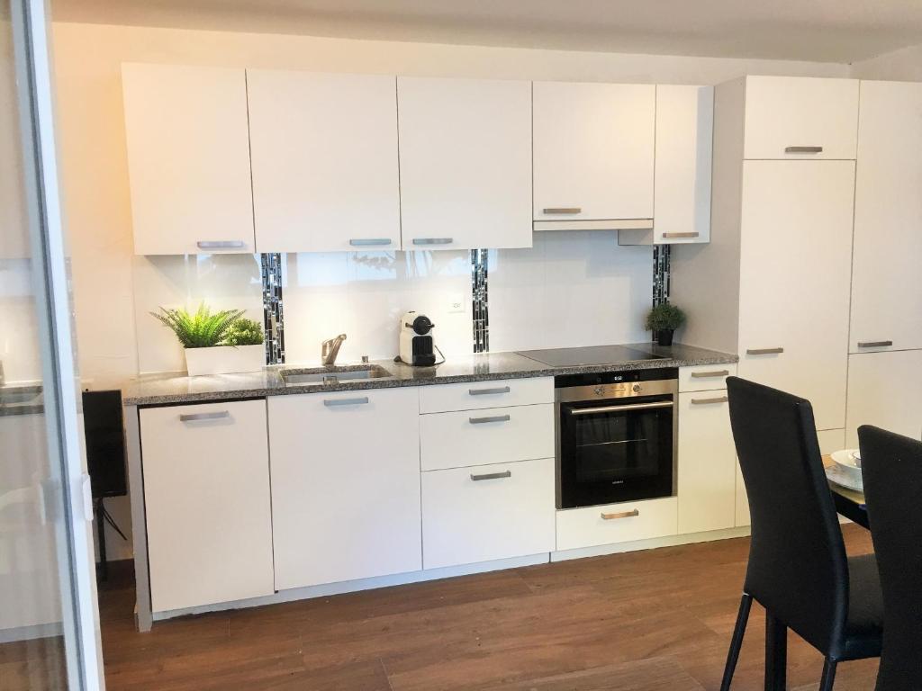 Kuchyň nebo kuchyňský kout v ubytování Apartments Steinbock