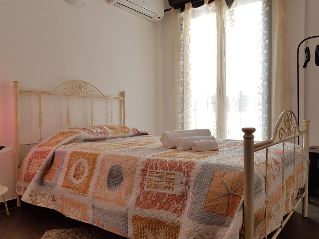 A bed or beds in a room at Terra del Sole Vittoria