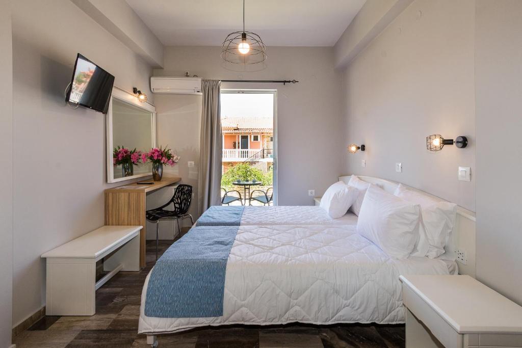 Posteľ alebo postele v izbe v ubytovaní Rooms 48 by Zante Plaza