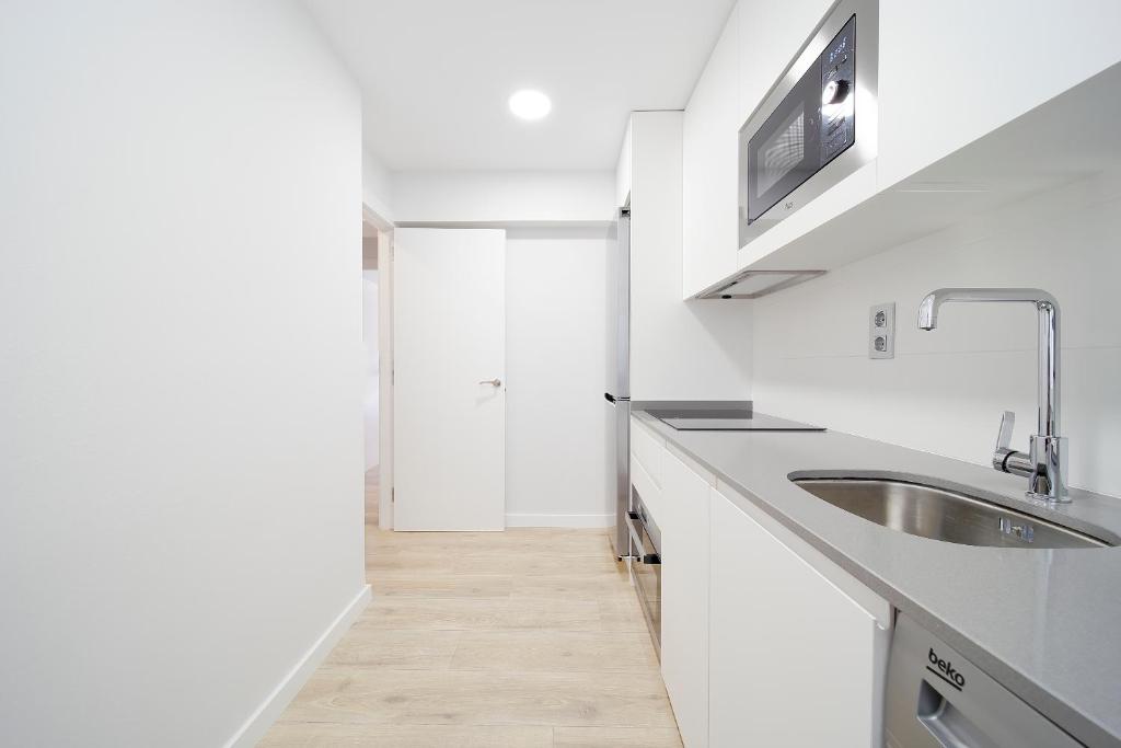 A kitchen or kitchenette at Apartamento Centro-Playa II