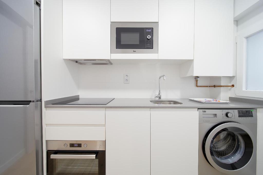 A kitchen or kitchenette at Apartamento Centro-Playa II
