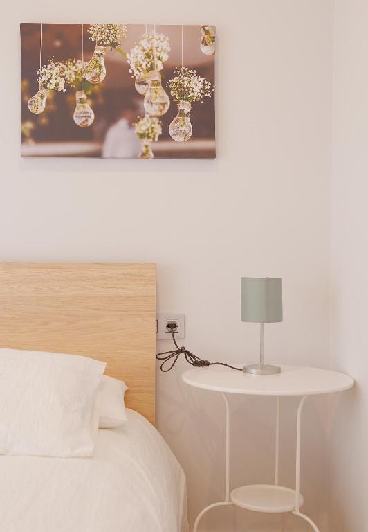 A bed or beds in a room at Apartamento Centro-Playa II