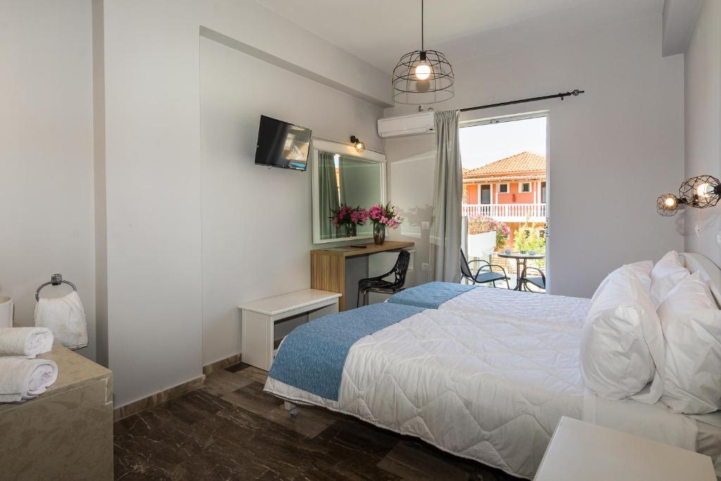 Posteľ alebo postele v izbe v ubytovaní Rooms 48 by Zante Plaza