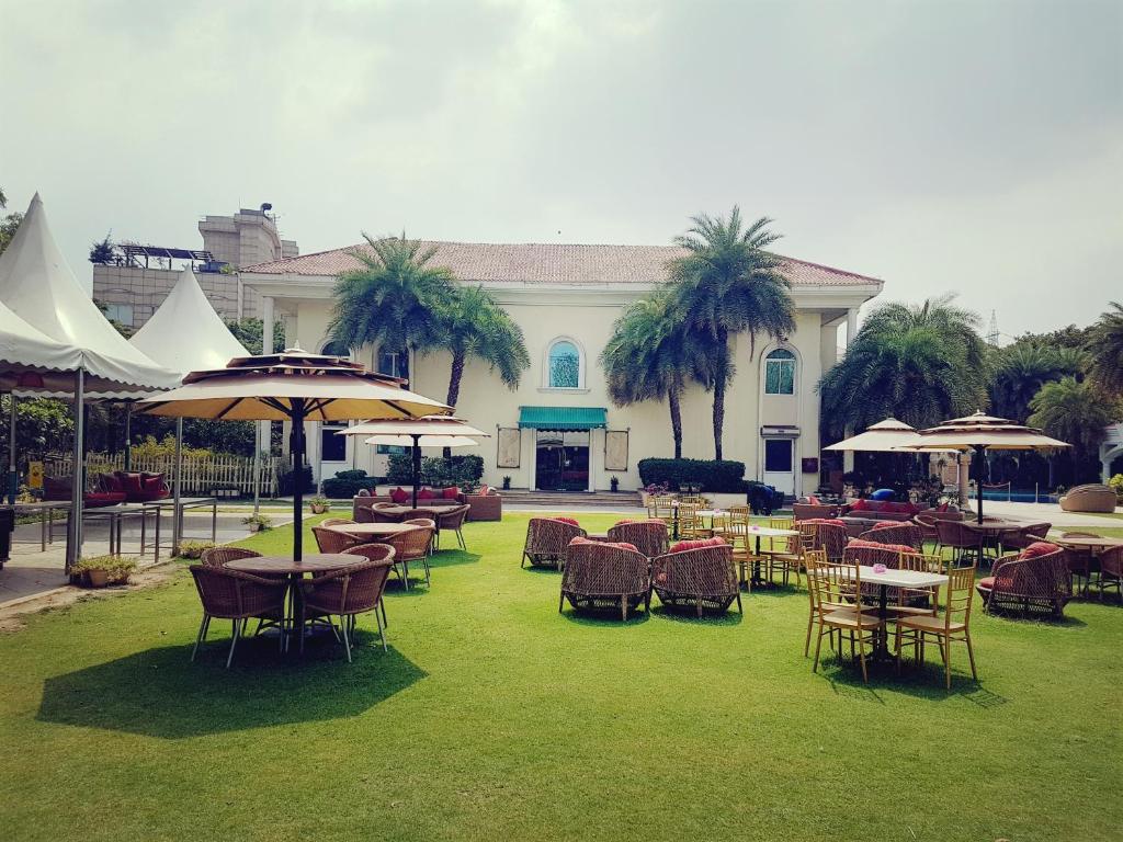 Zahrada ubytování The Palms Town & Country Club - Resort