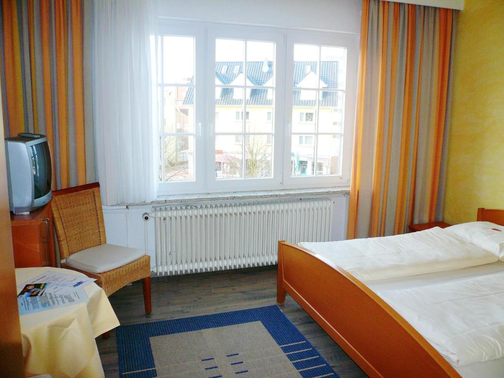 Postelja oz. postelje v sobi nastanitve Hotel-Restaurant Nord-Stuv