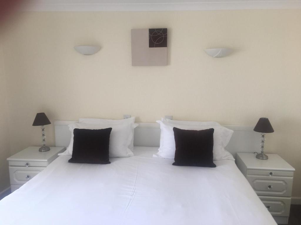 Letto o letti in una camera di Beau Rivage