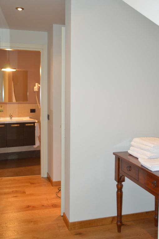 Postel nebo postele na pokoji v ubytování Locanda Blum In