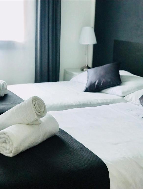 Postel nebo postele na pokoji v ubytování B&B Osteria Morganti