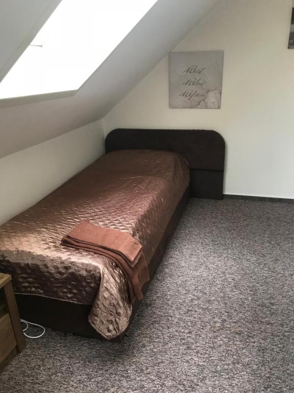 Postel nebo postele na pokoji v ubytování Penzion Ema B&B