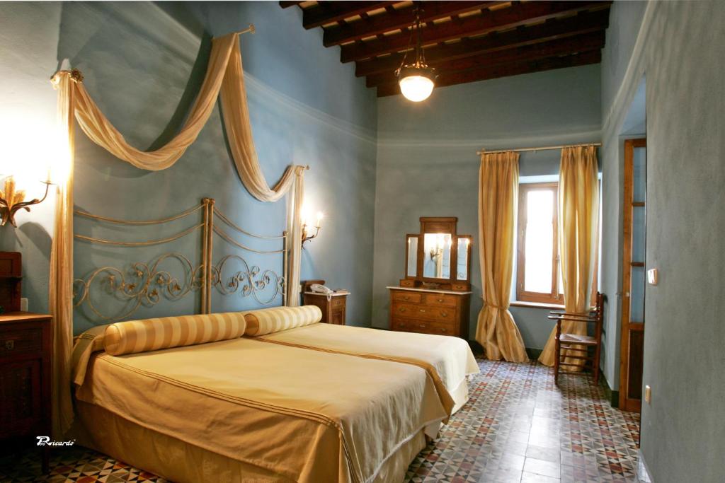 Postel nebo postele na pokoji v ubytování Posada de Palacio