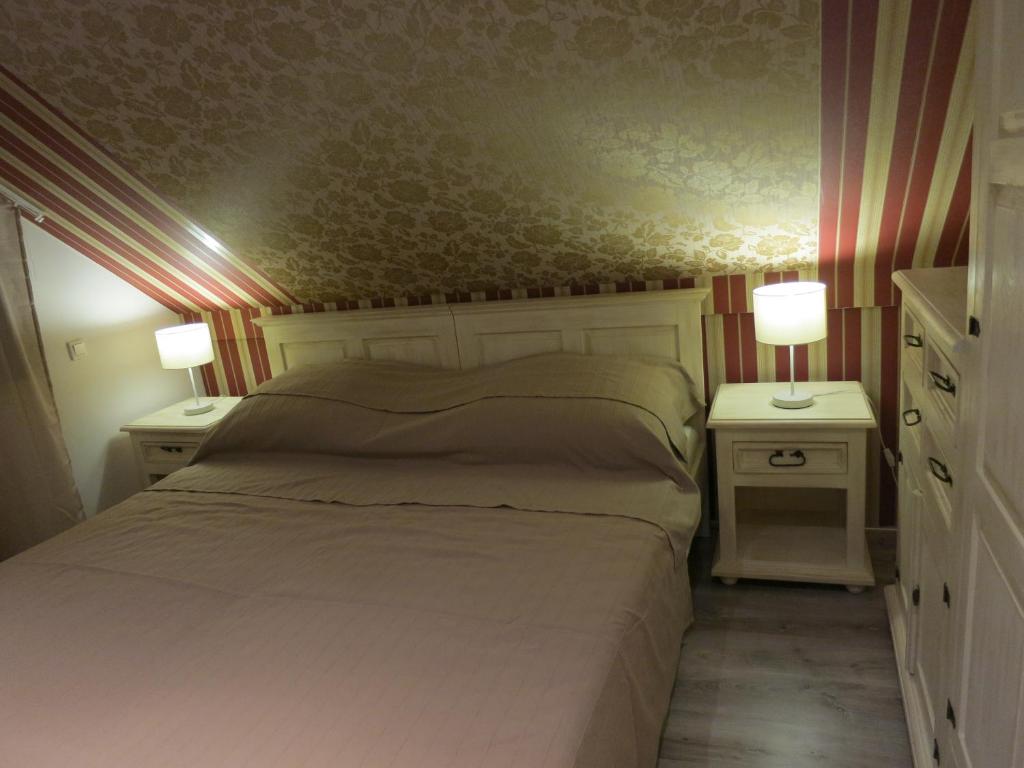 Postel nebo postele na pokoji v ubytování Vilka Relax
