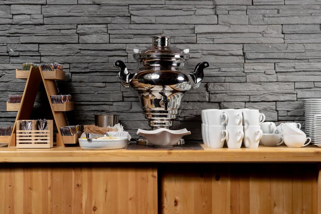 Příslušenství pro přípravu čaje a kávy v ubytování Bohinj Eco Hotel