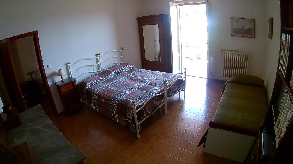 Postel nebo postele na pokoji v ubytování Casa di Vittoria