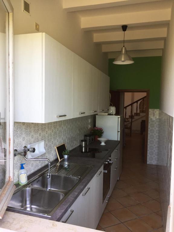 Kuchyň nebo kuchyňský kout v ubytování Casa di Vittoria