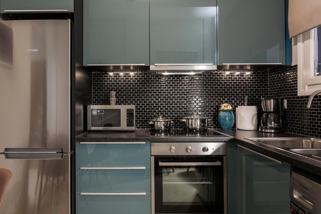 Kuchyň nebo kuchyňský kout v ubytování Safe, Central, Smart Double Rooms in apartment, next metro station walk to Acropolis
