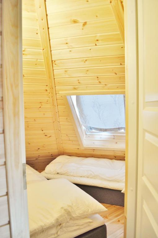 Postel nebo postele na pokoji v ubytování Cape Marina Lodge