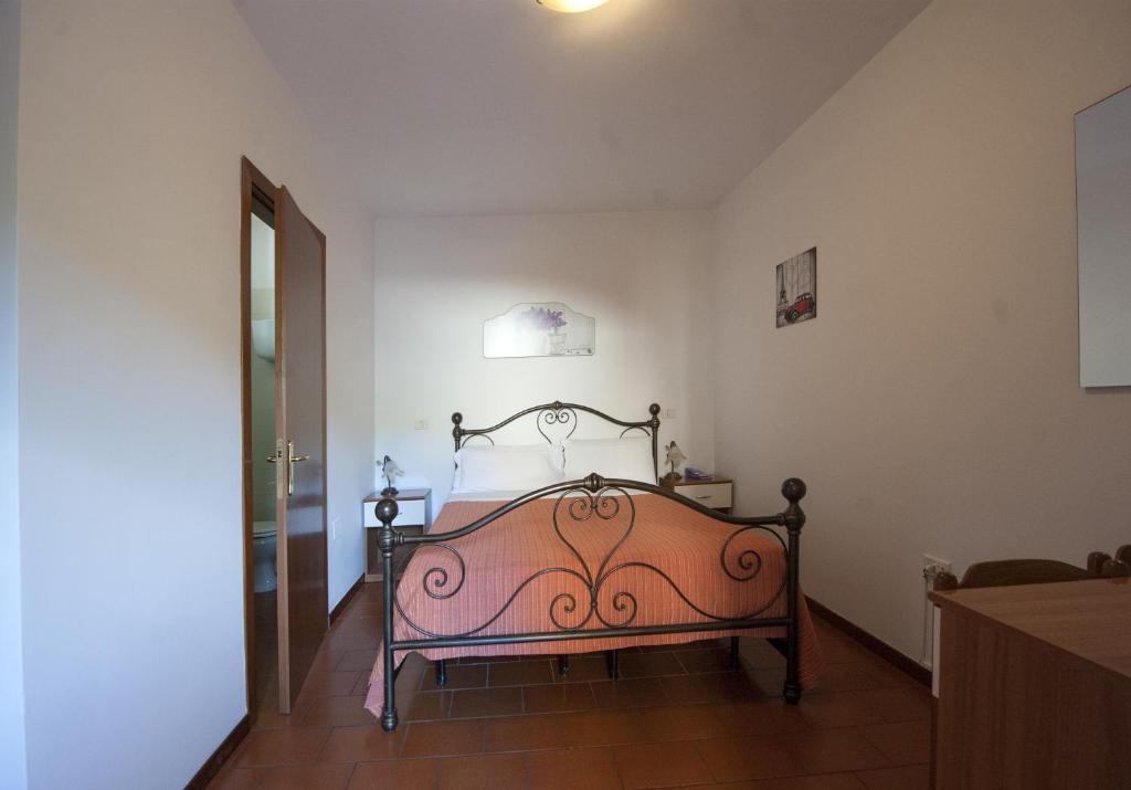 A bed or beds in a room at Hotel Athena
