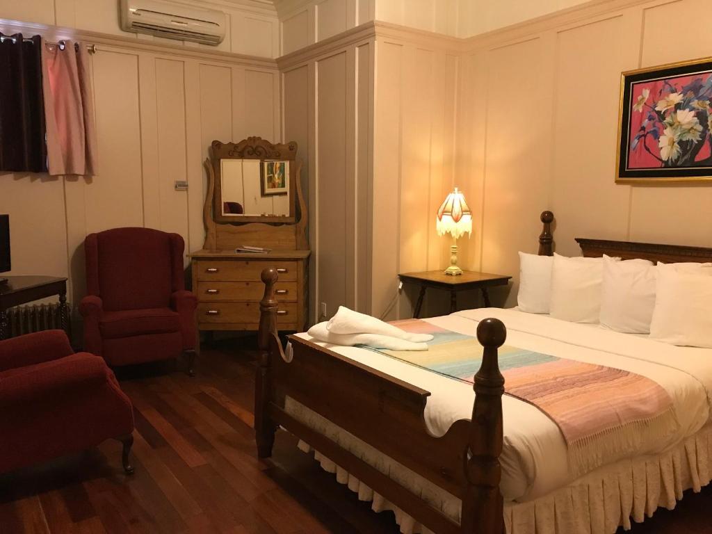 Postel nebo postele na pokoji v ubytování Hôtel-Auberge la Grande Maison et Spa