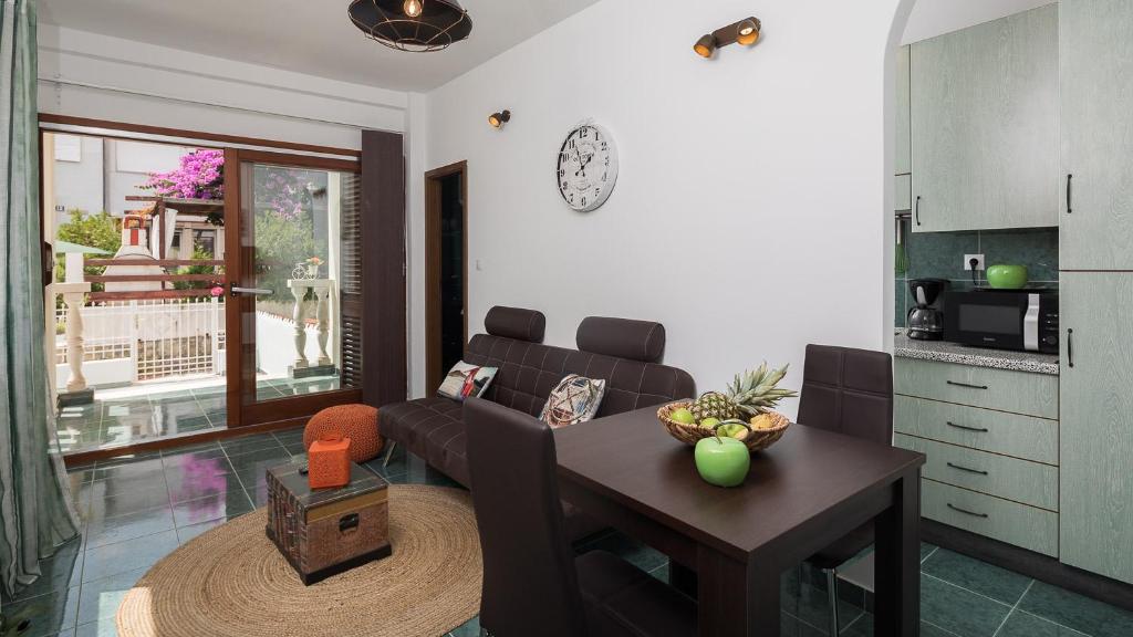 a living room with a couch and a table at "NM" Luxury apartments in Split