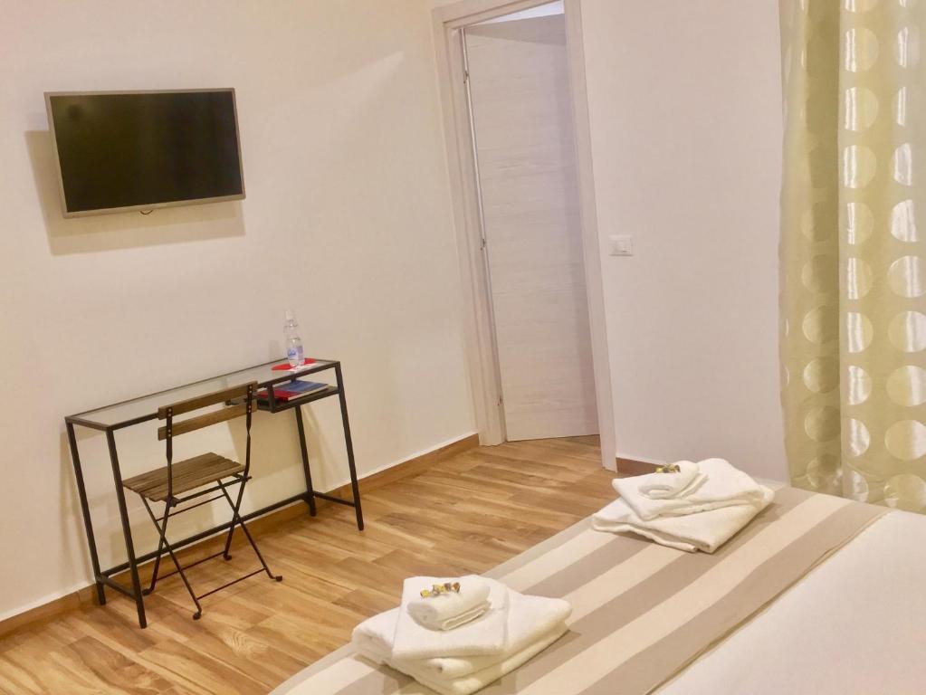 TV a/nebo společenská místnost v ubytování Cavallotti 21