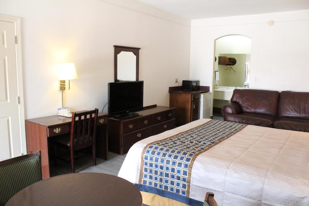 Postel nebo postele na pokoji v ubytování Texas Inn Downtown McAllen