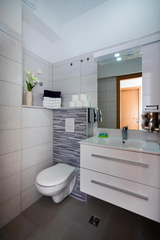 Kúpeľňa v ubytovaní Apartments Intrada