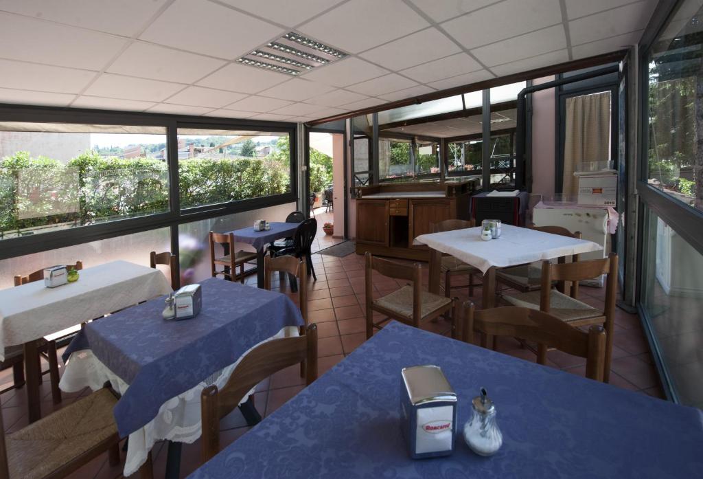 A restaurant or other place to eat at Hotel Athena