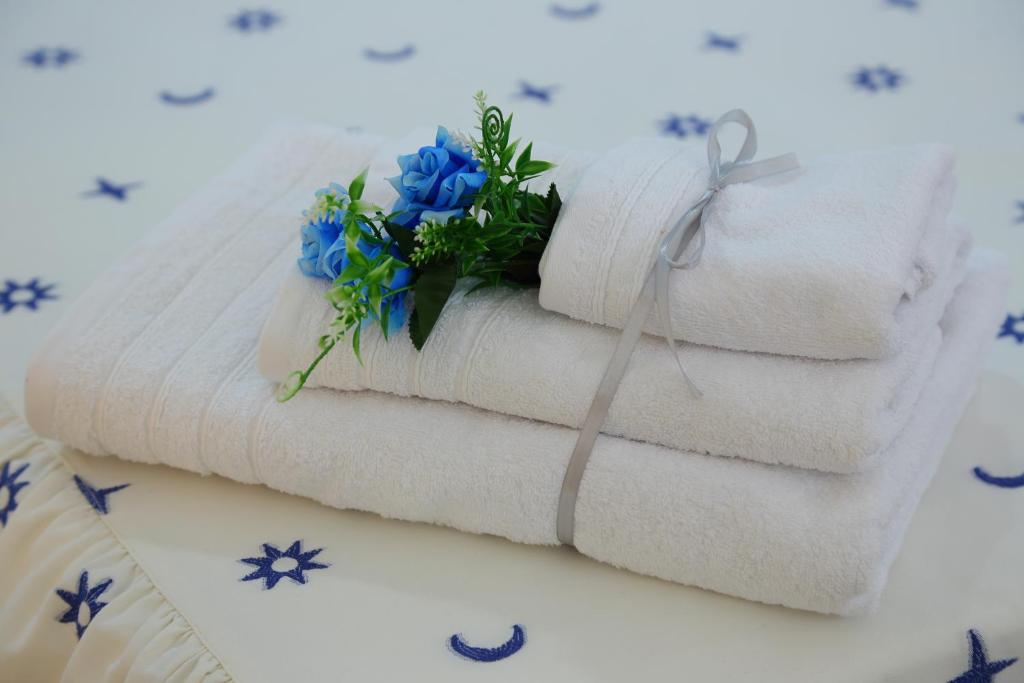 Posteľ alebo postele v izbe v ubytovaní B&B Il Melograno Antico con Terrazza e Giardino