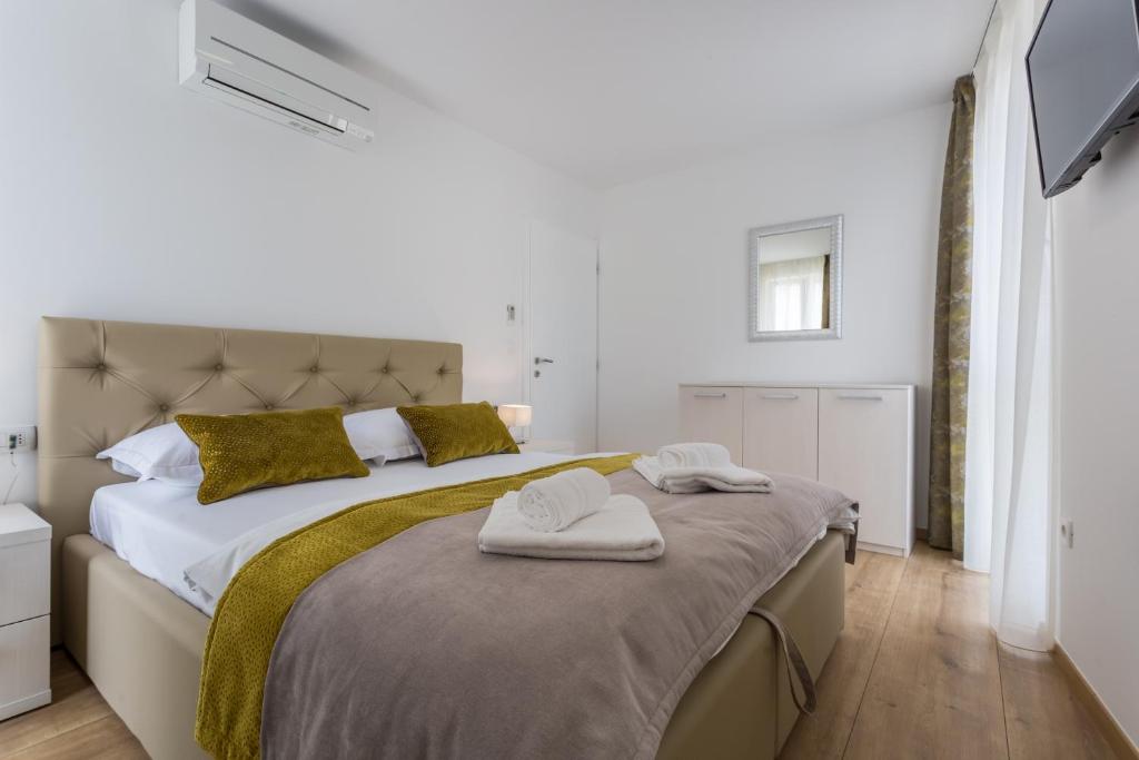 Łóżko lub łóżka w pokoju w obiekcie Pure Relax