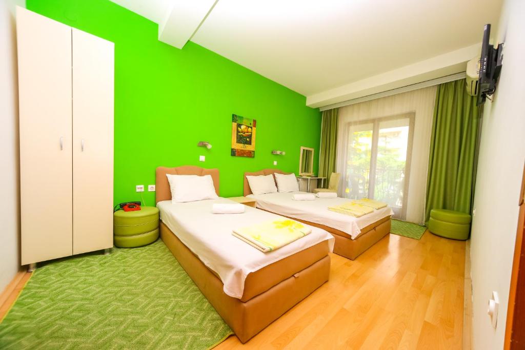Postel nebo postele na pokoji v ubytování Hotel Pine