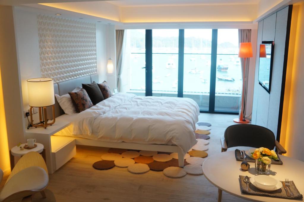 Voodi või voodid majutusasutuse The Pier Hotel toas