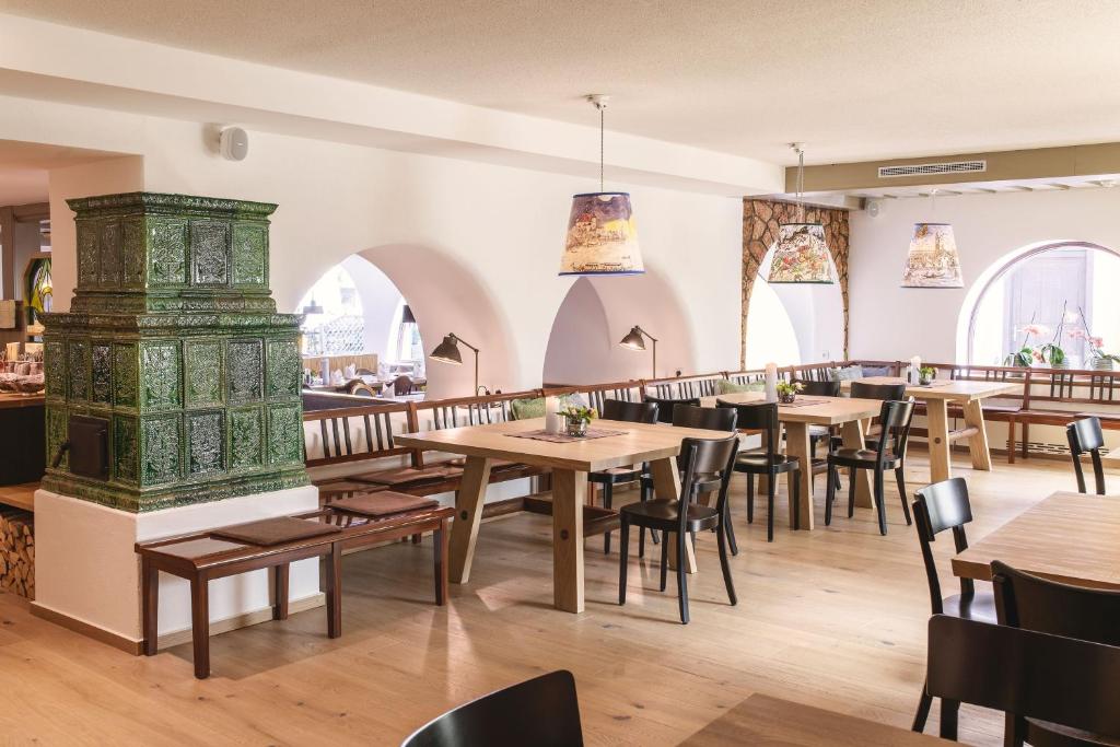 Reštaurácia alebo iné gastronomické zariadenie v ubytovaní PRIVATE SUITES