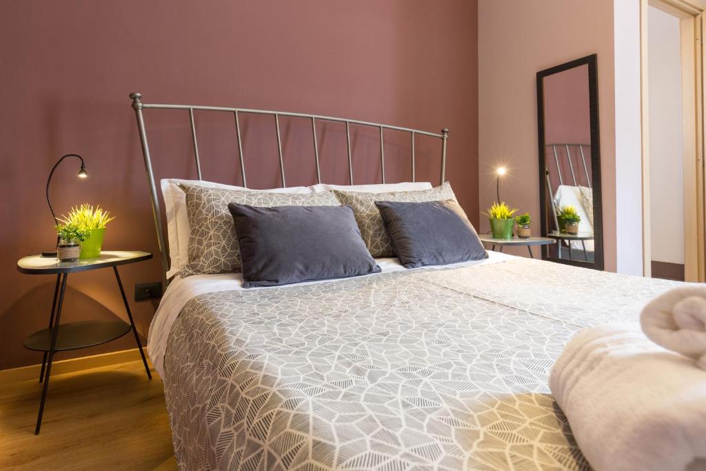 A bed or beds in a room at B&B Miro Centro Catania
