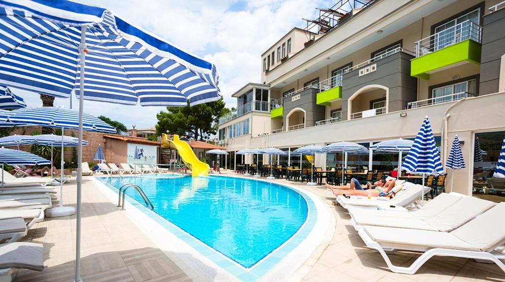 The swimming pool at or close to Rich Melissa Hotel